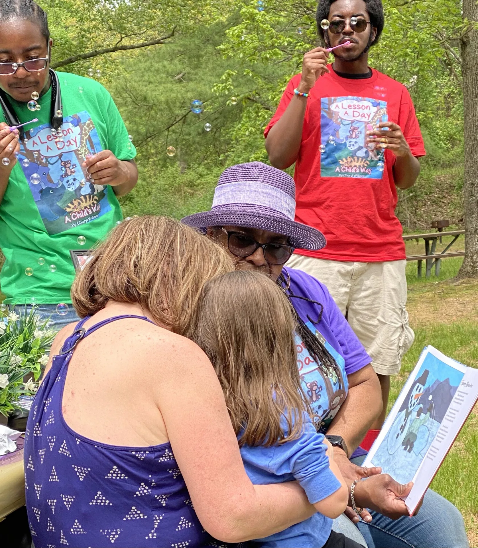 Reading A Lesson a Day with children at Belmont Lake State Park.